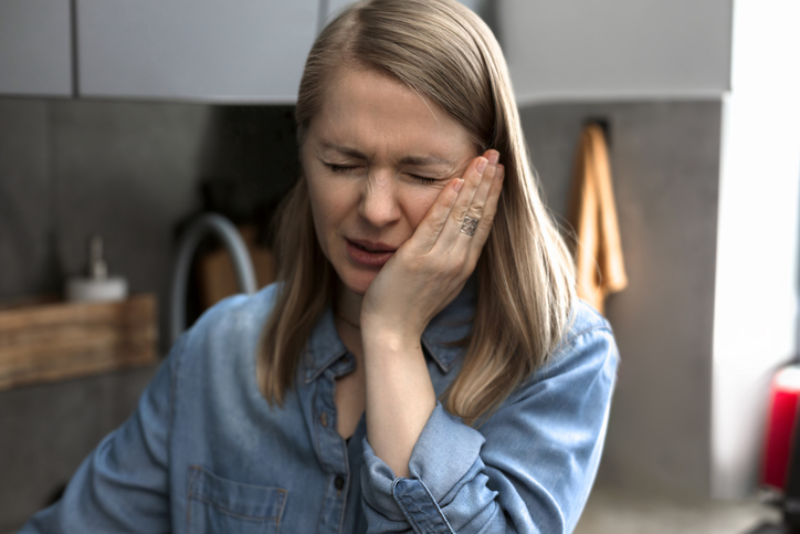 Young Woman Having Toothache At Home Trigeminal Neuralgia