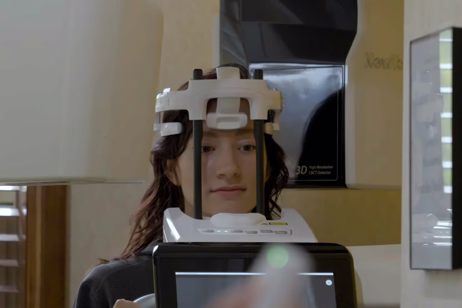 Patient positioned in the practice's 3D cone-beam CT scanner